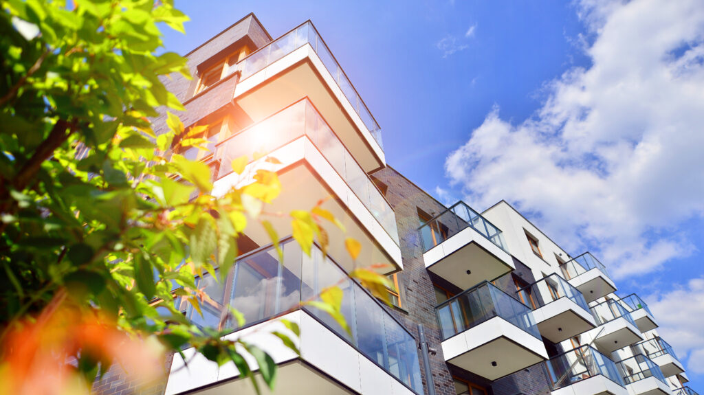 European residential architecture harmonizing with nature. Eco-friendly living in city with greens.